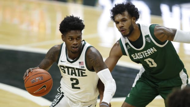 Nov 25, 2020; East Lansing, Michigan, USA; Michigan State Spartans guard Rocket Watts (2) dribbles the ball against Eastern Michigan Eagles guard Yeikson Montero (0) during the first half at Jack Breslin Student Events Center. Mandatory Credit: Raj Mehta-USA TODAY Sports
